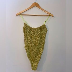 Green lacy body suit